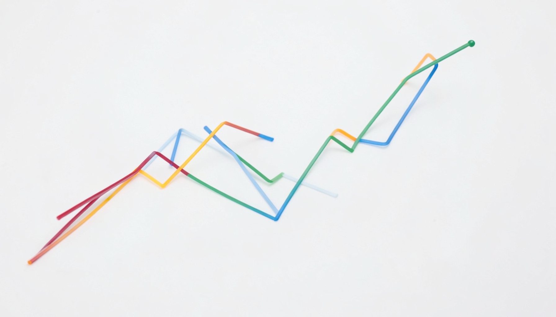 Abstract data visualization with upward-trending lines on a light background, conveying growth and analytics
